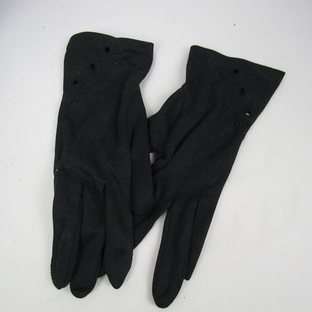 Vintage women's hankies and gloves.